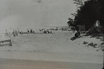 View south along the beach; lots of bathers